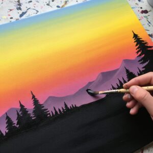 Adding simple tree silhouettes to finished sunset painting for dramatic effect