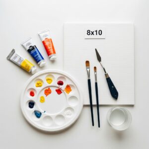 hree paint colors and brushes laid out for easy sunset painting tutorial