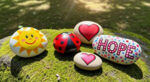 Rock Painting Magic: Your Complete Guide to Acrylic Painting on Rocks 2 painted kindness rocks in park