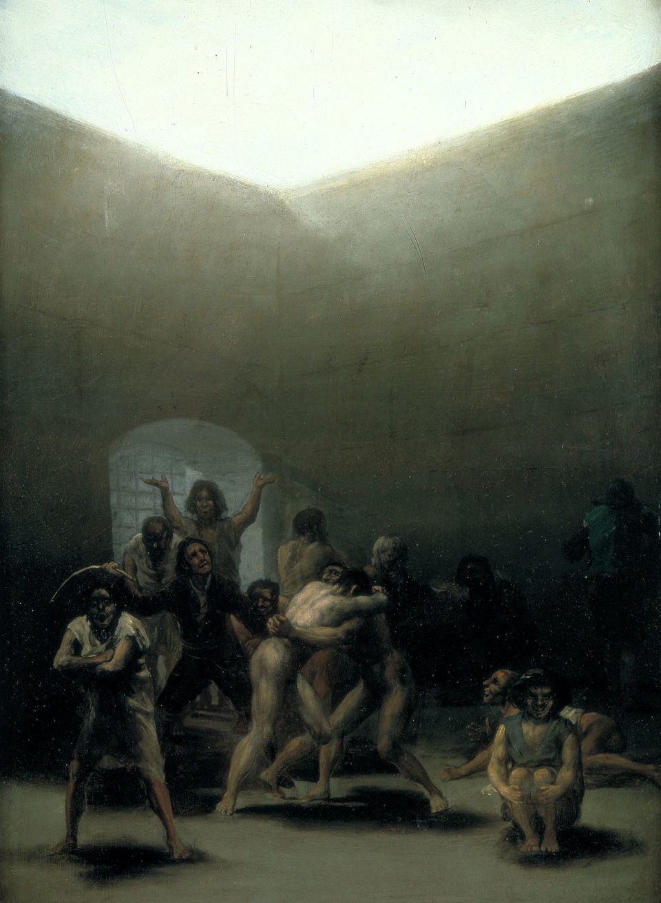 Master of Shadows: Discover the Top 10 Goya Paintings That Changed Art Forever 12 "Yard with Lunatics" by Goya, painted in 1794. Description: This small but intense painting shows the inside of a mental asylum. Goya, who had recently suffered a severe illness that left him deaf, became deeply interested in human suffering. The scene is chaotic, with inmates fighting, staring into space, or being disciplined, all under a cold, high light from above.. Interesting fact: This was one of the first times in art history that mental illness was depicted with such raw, unsentimental realism.