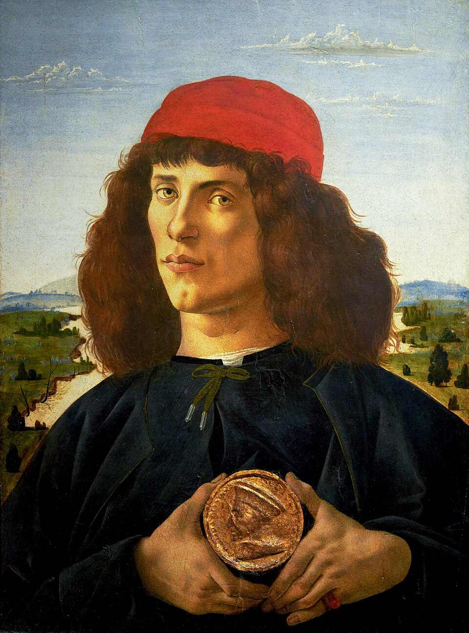 A painting by Botticelli titled 'Portrait of a Young Man with a Roundel', depicting This striking portrait shows a handsome young man from the Florentine elite, holding a small circula…